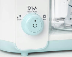 Close up of the dial on the baby steam and blend on a white background