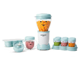 nutribullet Baby with carrots on white background.