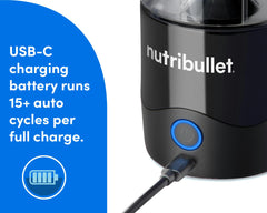 A closeup of the USB-C charger plugged into the charging port in the Power Base of the nutribullet Portable Blender. A blue panel on the left reads "USB-C-charging battery runs 15+ cycles per full charge" An icon showing a charged battery in a circle is situated beneath the text.