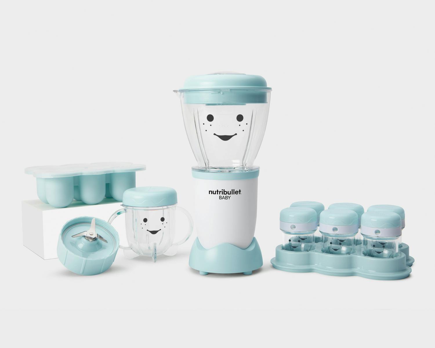 NutriBullet Baby with batchbowl, easy pop freezer tray with lid, 6 storage cups with tray, short cup with lid.