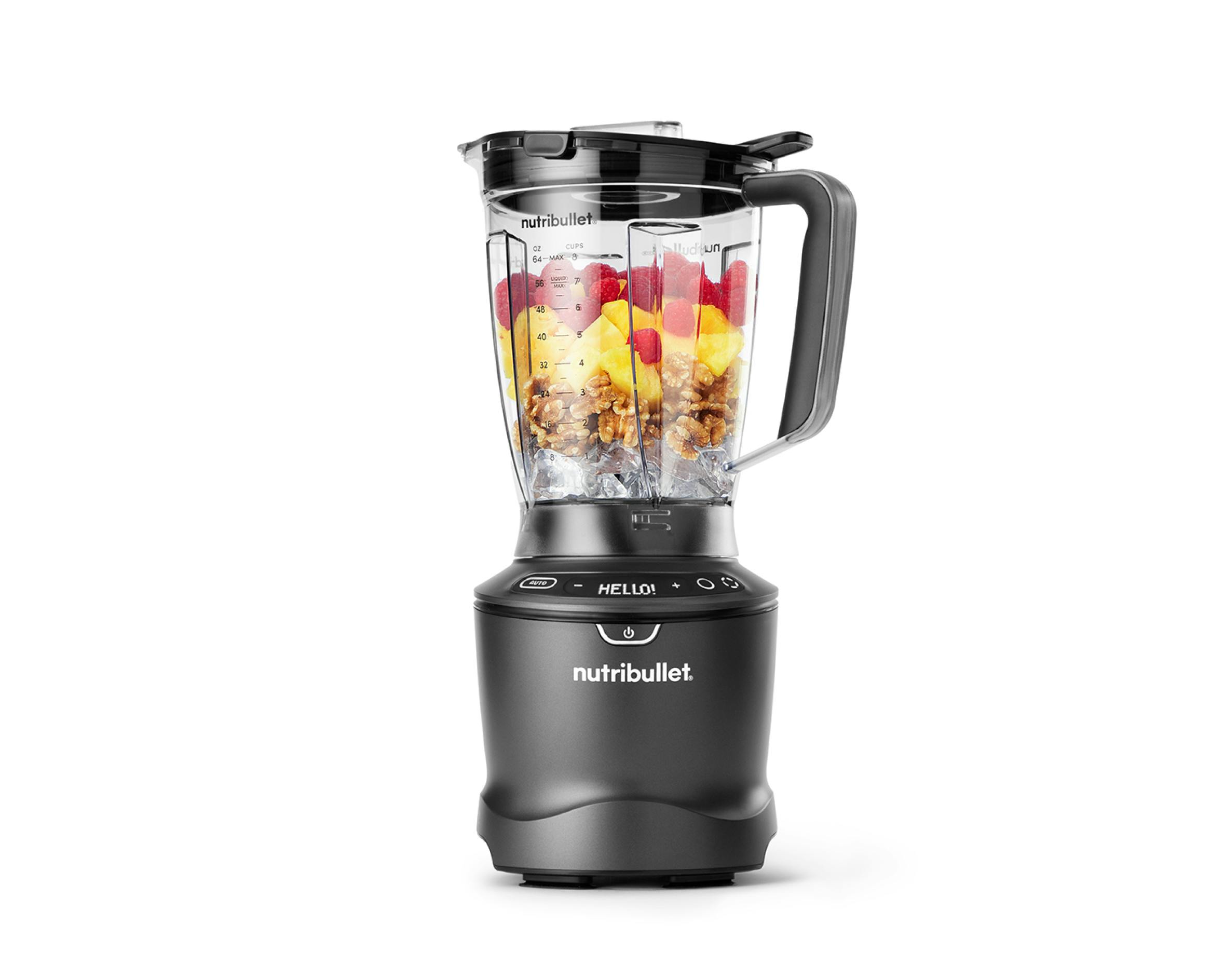 Image of the fully-assembled SmartSense Blender set on a white background. The blender pitcher is filled with colorful fruits.
