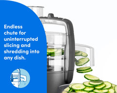 The nutribullet Limitless Food Processor shown slicing cucumbers through its endless chute attachment.
