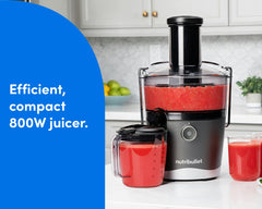 The nutribullet Juicer® with pitcher and cup filled with red juice on a kitchen countertop. A blue panel on the left reads "Efficient, compact 800W juicer".