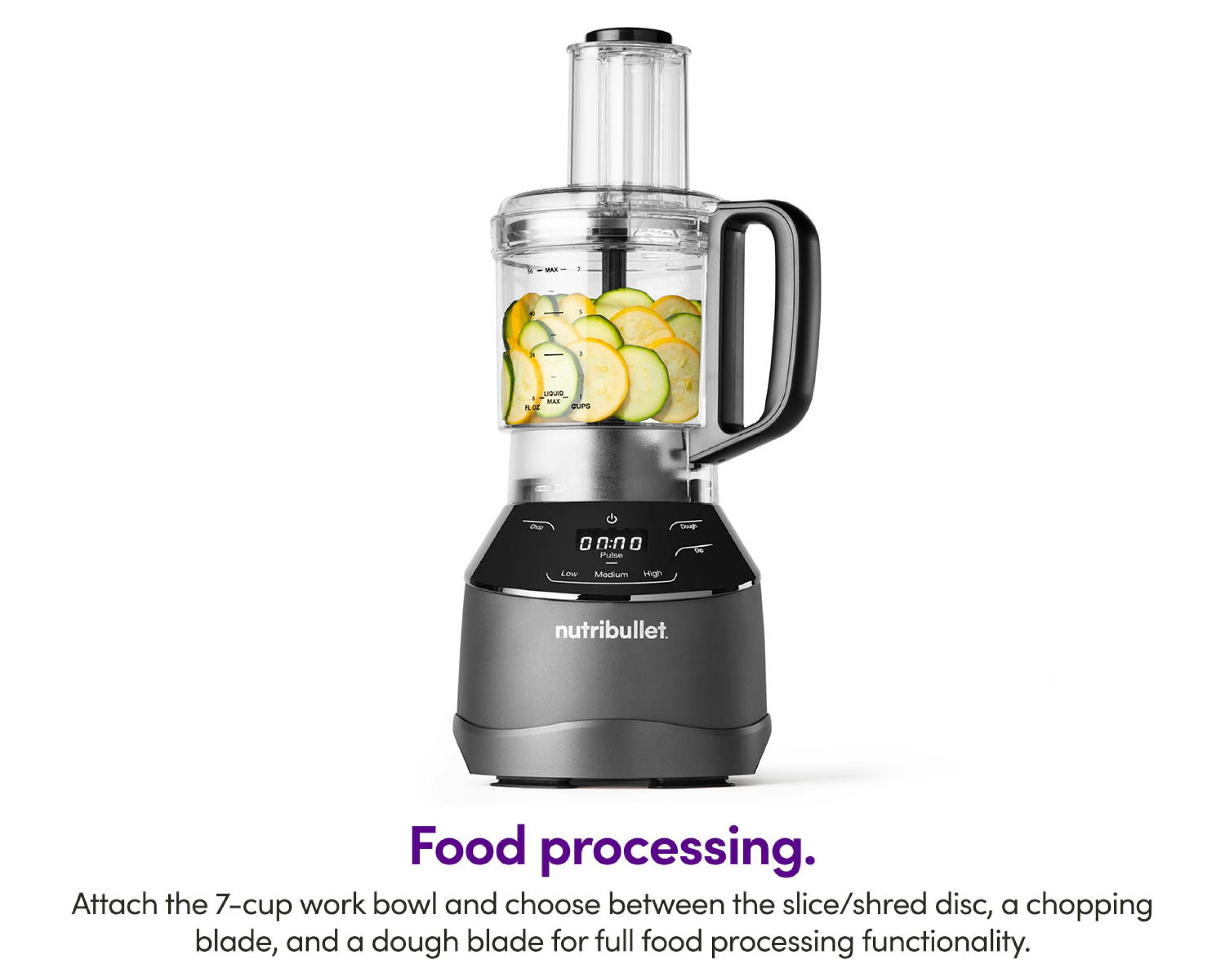 Food processor and base of nutribullet Triple Prep, filled with cucumbers