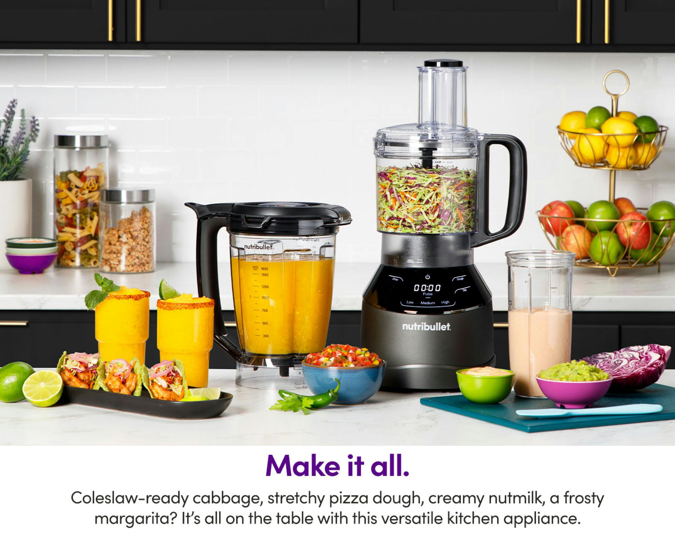 All elements of nutribullet Triple Prep System filled with food and drinks on kitchen's countertop