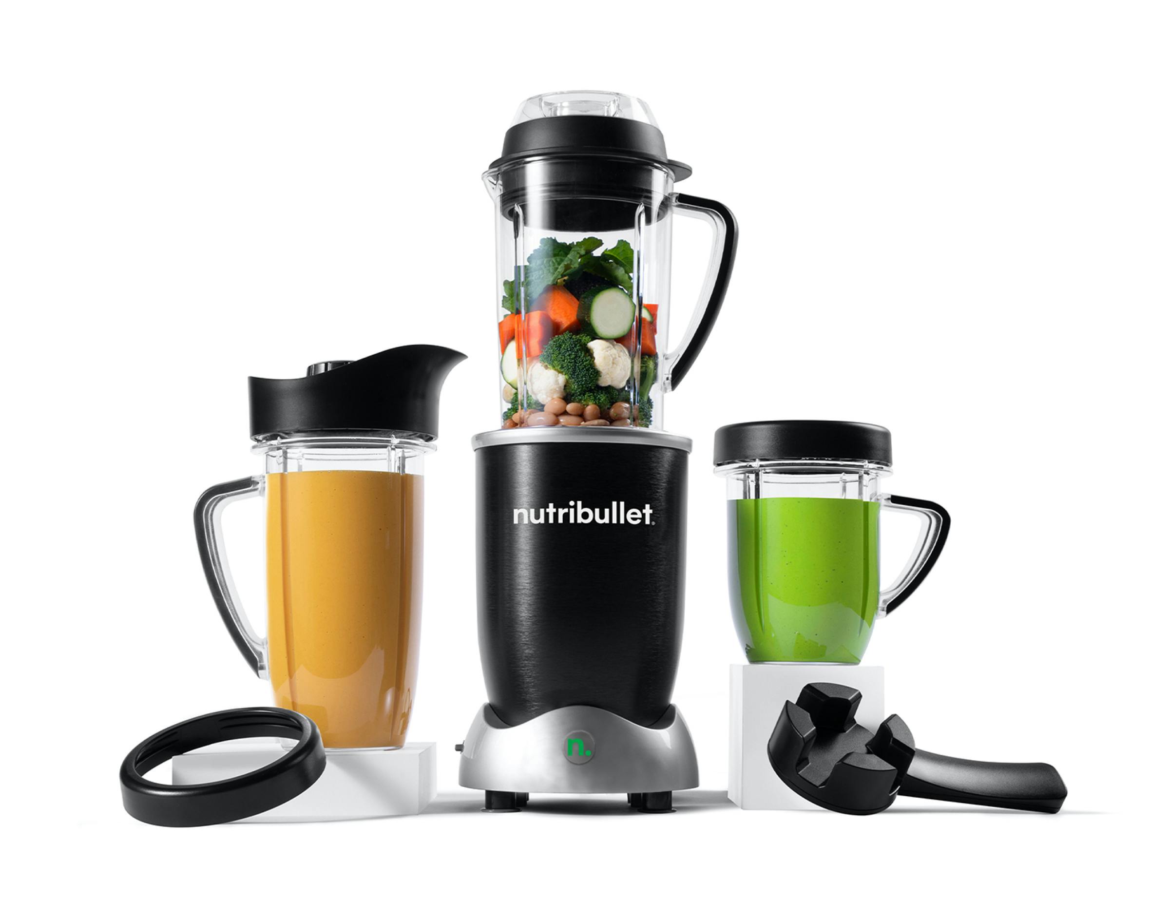 nutribullet Rx with vegetables and beans on white background.