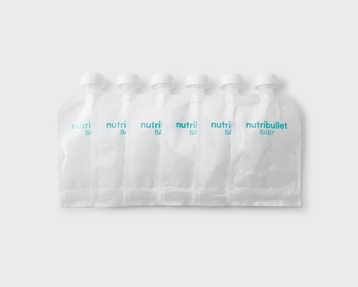 Row of NutriBullet Baby white reusable squeeze pouches with blue writing.