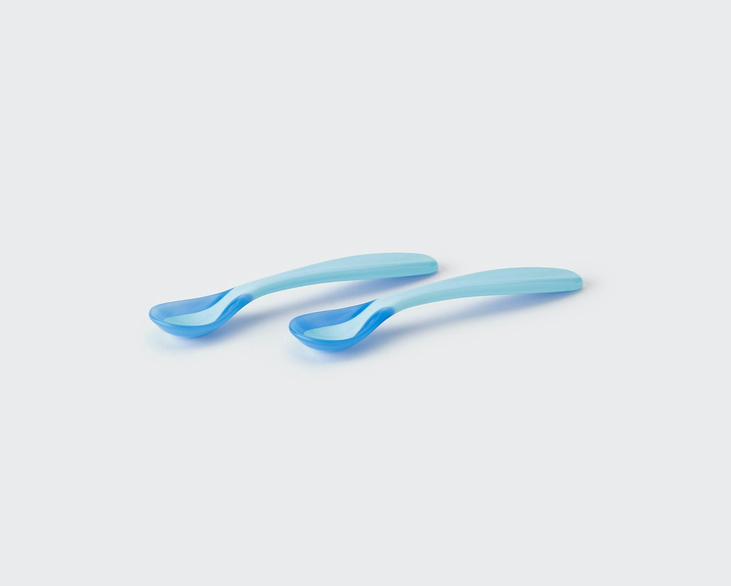 Two NutriBullet Baby blue spoons side by side.
