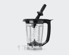 NutriBullet Smart Touch Blender 64 oz pitcher and tamper set on gray background.