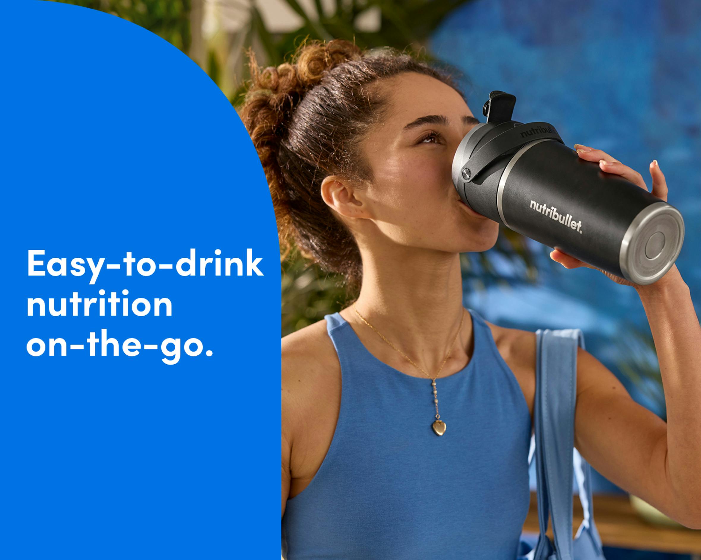 Woman drinking from the nutribullet Flip Insulated Portable Blender. Easy-to-drink nutrition on-the-go.